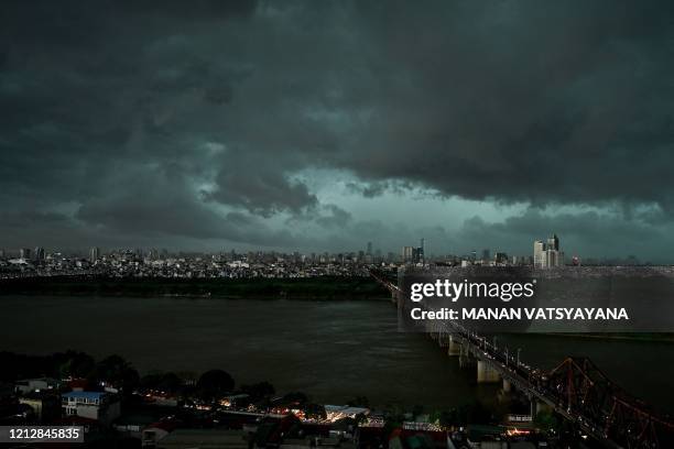 Dark clouds loom over the Hanoi skyline on May 13, 2020.