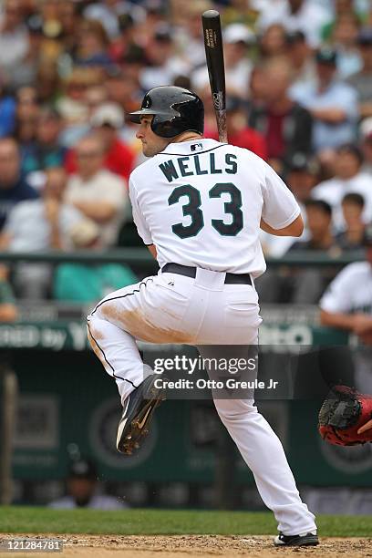 Casper Wells of the Seattle Mariners bats against the Boston Red Sox at Safeco Field on August 14, 2011 in Seattle, Washington.