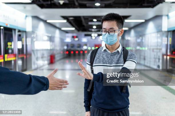 Refusing Handshake Photos and Premium High Res Pictures - Getty Images