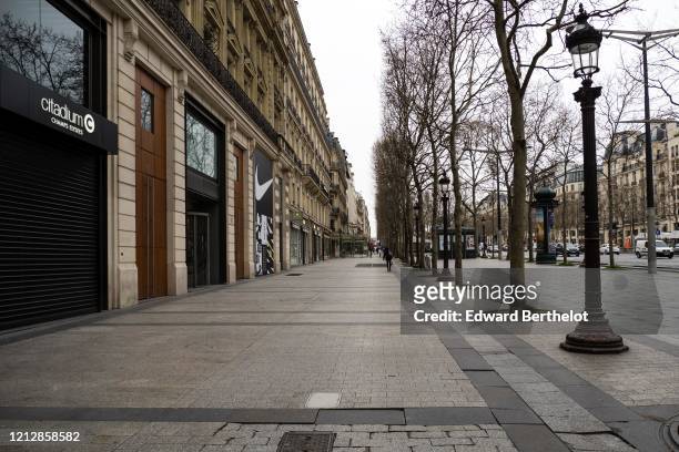 General view of the empty Avenue des Champs Elysees, in the 8th quarter of Paris, as the city imposes emergency measures to combat the Coronavirus...