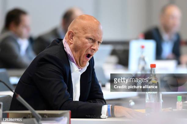 May 2020, Thuringia, Erfurt: Thomas Kemmerich , former Minister President of Thuringia, follows the debate during the state parliament session in the...