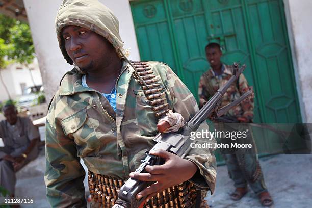 Somali Transitional Federal Government , soldiers stand guard in the Bakara market on August 17, 2011 in Mogadishu, Somalia. Islamist extremist...