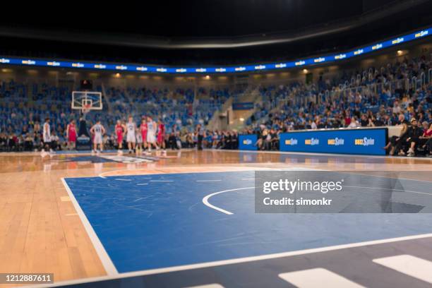 view of basketball court - basketball court floor stock pictures, royalty-free photos & images