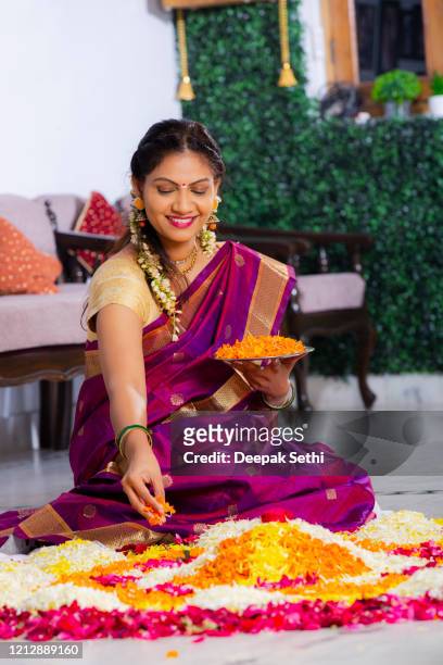 south indian woman with classic look stock photo - rangoli stock pictures, royalty-free photos & images