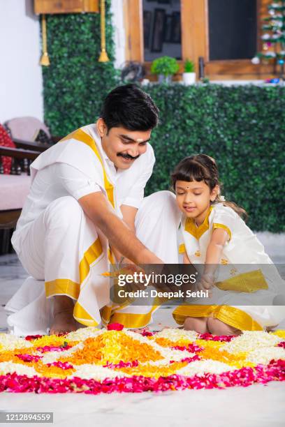 south indian father daughter with classic look stock photo - diwali family stock pictures, royalty-free photos & images