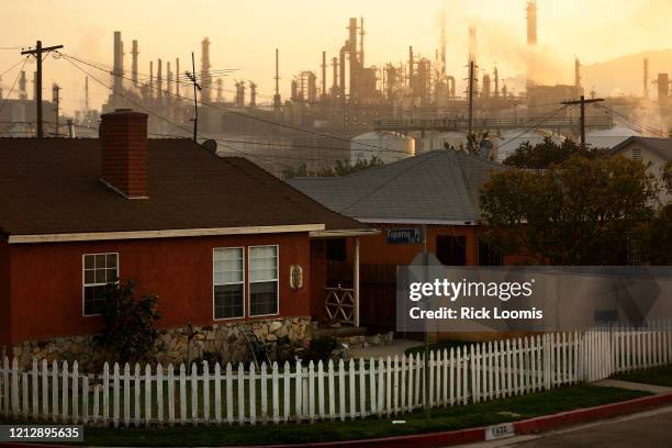 The Phillips 66 refinery looms over a Wilmington neighborhood where some long-time residents feel their health issues might stem from their proximity...