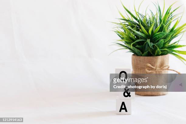 q and a wriiten on wooden blocks. - q and a stock pictures, royalty-free photos & images