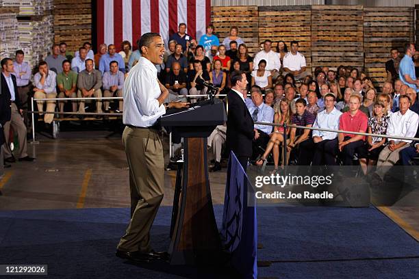 President Barack Obama speaks at a town hall-style meeting at Wyffels Hybrids Inc. On August 17, 2011 in Atkinson, Illinois. President Obama is on...