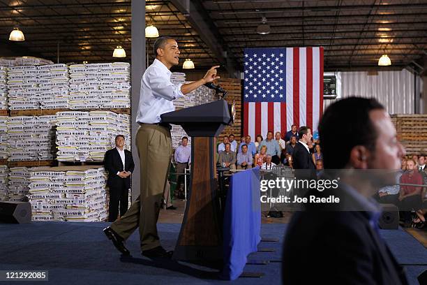 President Barack Obama speaks at a town hall-style meeting at Wyffels Hybrids Inc. On August 17, 2011 in Atkinson, Illinois. President Obama is on...