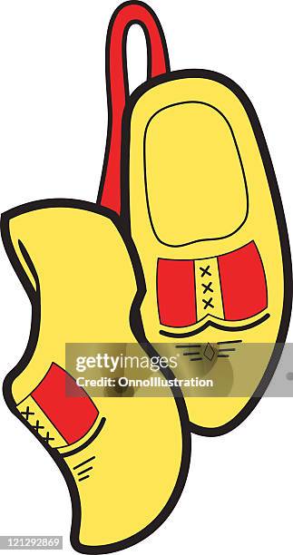 hanging dutch clogs - clogs stock illustrations