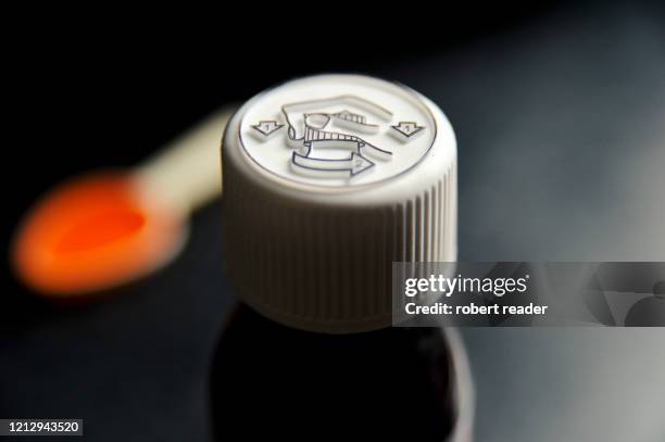 child proof medicine bottle cap and medicine - child proof stock pictures, royalty-free photos & images