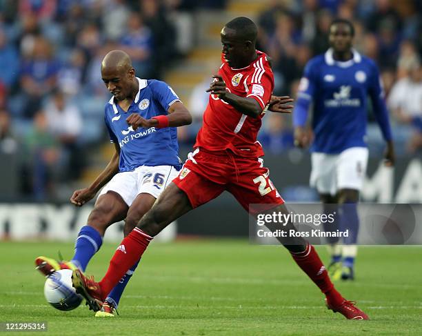 Gelson Fernandes of Leicester is challenged by Albert Adomah of Bristol during the npower Championship match between Leicester City and Bristol City...