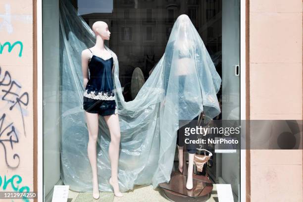 Two woman dummies in a close dress shop in the city center of Roma during the Fase 2 , after the lockdown of the nation due to the Covid-19 outbreak,...