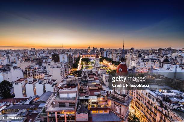 buenos aires skyline at sunset - buenos aires aerial stock pictures, royalty-free photos & images