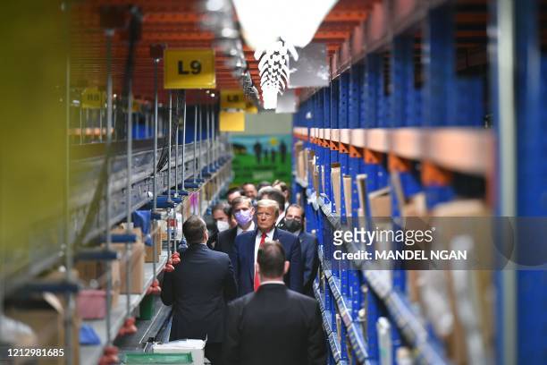 President Donald Trump visits medical supply distributor Owens and Minor Inc. In Allentown, Pennsylvania on May 14, 2020.