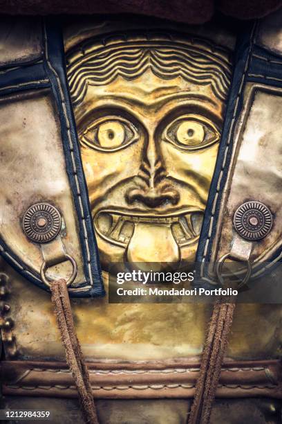 4th/5th Century BC. Etruscan warriors: hypothetical reenactment of customs and traditions. Leather cuirass with embossed bronze plates and a...