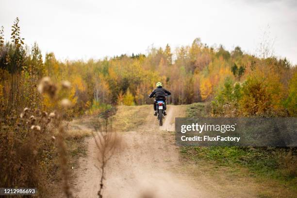 riding a motorbike is freedom - motocross stock pictures, royalty-free photos & images