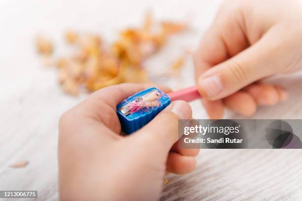 child draw with crayons - pencil sharpener stock pictures, royalty-free photos & images