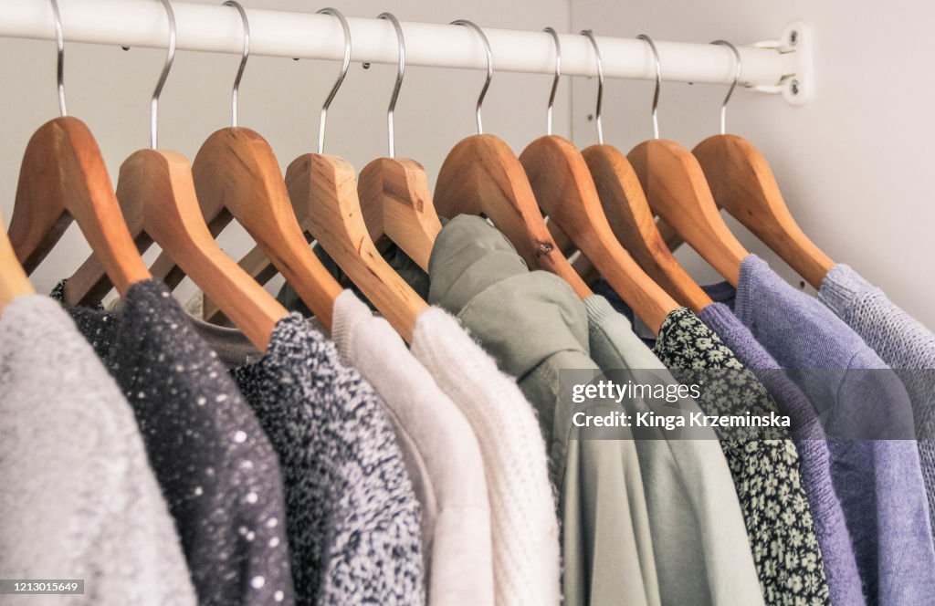 Clothes hanging in the wardrobe