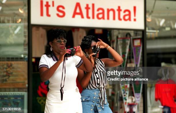 Die XXVI. Olympischen Sommerspiele finden vom 19. Juli bis 4. August 1996 in Atlanta statt. Touristen mit gezückten Kameras werden in diesem Zeitraum...