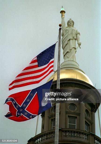 Die XXVI. Olympischen Sommerspiele finden vom 19. Juli bis 4. August 1996 in Atlanta statt. Symbolträchtig wehen hier im Zentrum der Hauptstadt des...