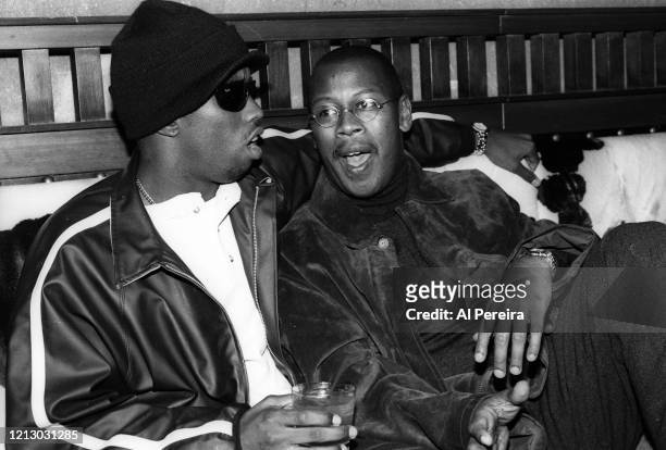 Hip-Hop Producer/Executive/Label Head Andre Harrell relaxes in a nightclub VIP area by chatting with Sean "Puffy" Combs on November 12, 1994 in New...