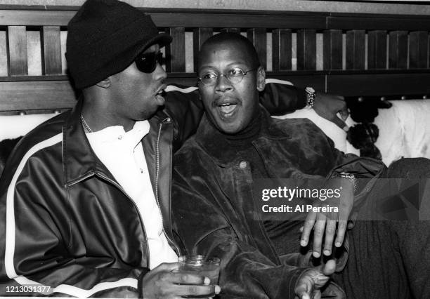 Hip-Hop Producer/Executive/Label Head Andre Harrell relaxes in a nightclub VIP area by chatting with Sean "Puffy" Combs on November 12, 1994 in New...