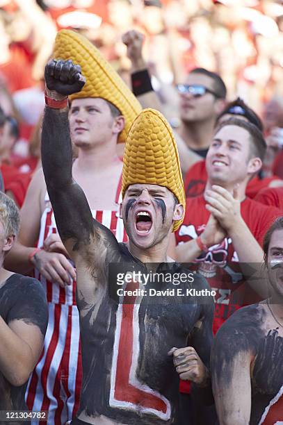 Nebraska painted fan wearing corn hat in stands during game vs Western Kentucky at Memorial Stadium. Lincoln, NE 9/4/2010 CREDIT: David E. Klutho