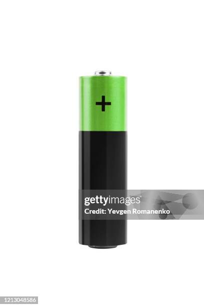 one aa battery isolated on white, with clipping path - pila fotografías e imágenes de stock