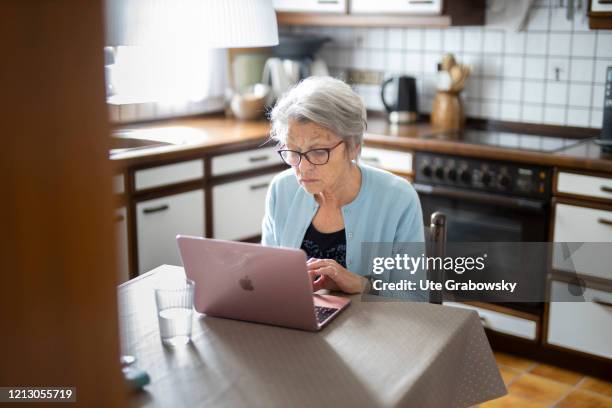 In this photo illustration a woman is using a laptop on May 12, 2020 in Radevormwald, Germany.
