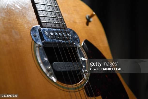 Detail of the guitar used by musician Kurt Cobain during Nirvana's famous MTV Unplugged in New York concert in 1993, is pictured at the Hard Rock...