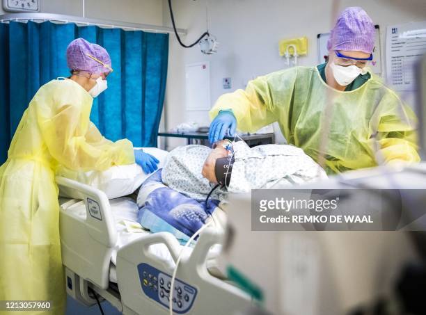 Medical staff attend to a patient in the intensive care unit of the HMC Westeinde Hospital in The Hague, The Netherlands, May 12 during the ongoing...