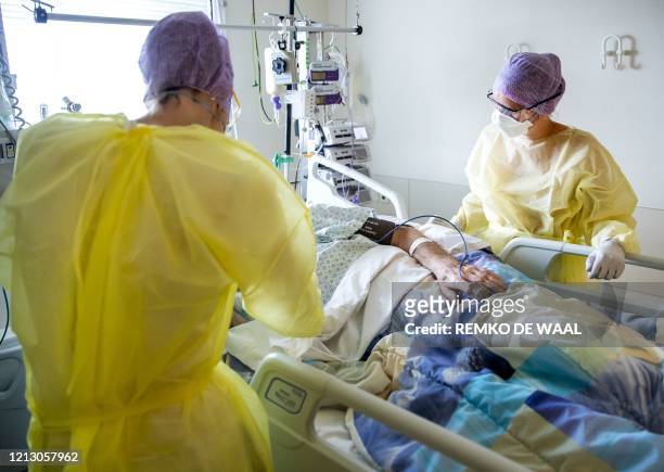 Medical staff attend to a patient in the intensive care unit of the HMC Westeinde Hospital in The Hague, The Netherlands, May 12 during the ongoing...