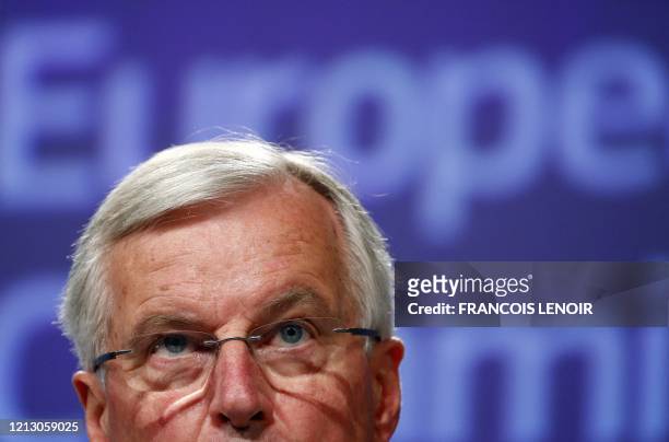 European Union's Brexit negotiator Michel Barnier speaks during a news conference following the third round of Brexit talks with Britain, in Brussels...