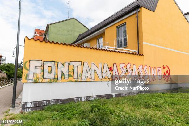 Fontana assassino&quot; is the graffito that appeared on a wall of a building in Via Vittorelli claimed by the party P.CARC during the Coronavirus...