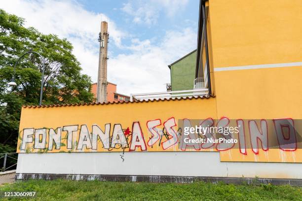 Fontana assassino&quot; is the graffito that appeared on a wall of a building in Via Vittorelli claimed by the party P.CARC during the Coronavirus...