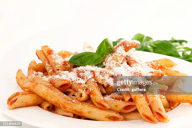 italian pasta with basil - tomato pasta stock pictures, royalty-free photos & images