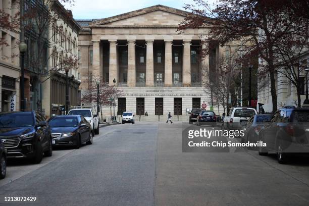 The Smithsonian National Portrait Gallery stands in the Penn Quarter neighborhood of the District of Columbia, which is unusually empty of vehicle...
