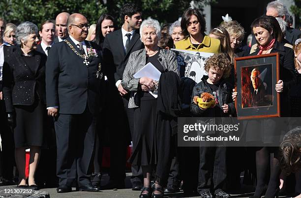 Lady Beverley Reeves and her daughters Sarah and Jane stand with Sir Anand Satyanand by the herse after the state funeral of former Governer General...