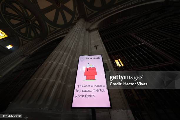 Electronic screens with notices of sanitary measures are seen in the Metropolitan Cathedral of Mexico City as a preventive measurement against the...