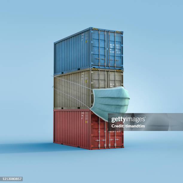 cargo containers wearing a mask - globalisierung stock-fotos und bilder