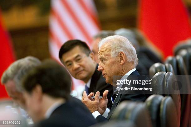 Joe Biden, U.S. Vice president, right, and Gary Locke, U.S. Ambassador to China, second from right, hold a bilateral meeting with Xi Jinping, China's...