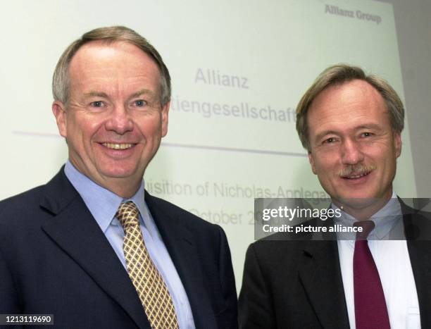 Arthur E. Nicholas von der US-Gesellschaft Nicholas-Applegate und Allianz-Vorstand Joachim Faber geben am in München die Übernahme der US-Firma durch...