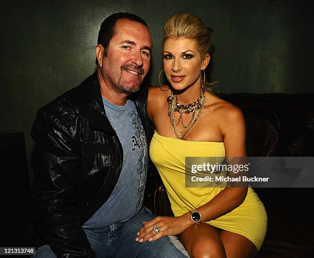 Jim Bellino and Real Housewife of Orange County Alexis Bellino attend the LG Revolution party hosted by Verizon at The Sayers Club on August 17, 2011...