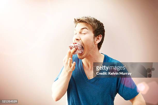 pleasure / pain - over eating stock pictures, royalty-free photos & images