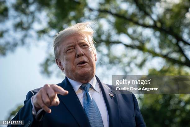 President Donald Trump speaks to reporters before boarding Marine One on the South Lawn of the White House on May 15, 2020 in Washington, DC....