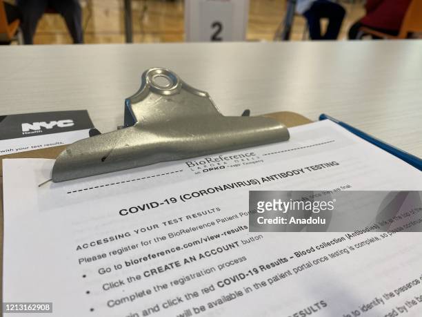 An information forms are seen where a coronavirus antibody testing is being at the NYPD Community Center in Brooklyn, New York, United States on May...