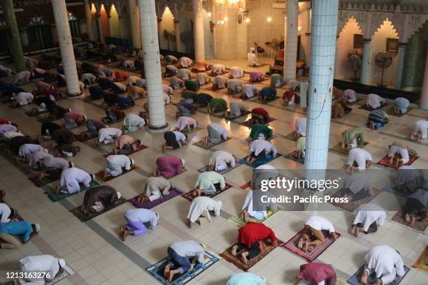 Bangladeshi Muslims offered their Jumma Prayers by maintaining social distancing and following the governments health advice. They were allowed to...