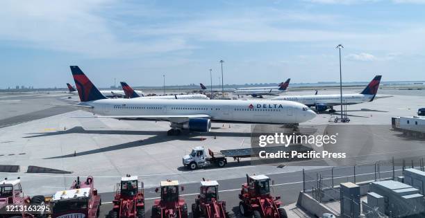 Idle airplanes of Delta airline seen during COVID-19 pandemic at JFK airport.