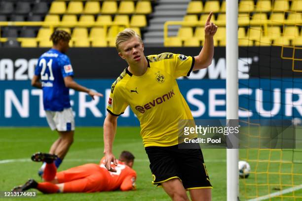 Erling Haaland of Borussia Dortmund celebrates scoring his team's first goal during the Bundesliga match between Borussia Dortmund and FC Schalke 04...